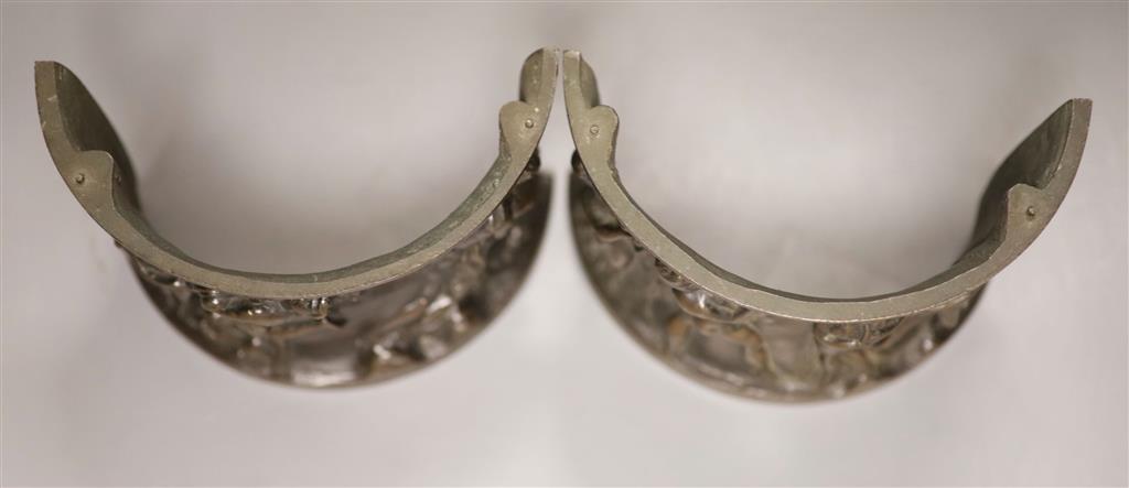 A cast bronze collar in two sections, length 14.5cm